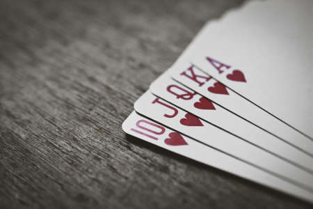 Closeup of heart royal flush the highest ranking hand in hold'em poker in horizontal viewの写真素材