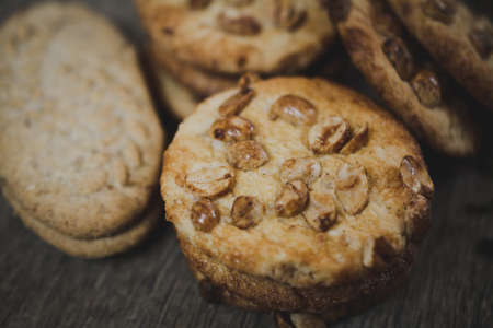Chocolate chip cookies on old wooden table