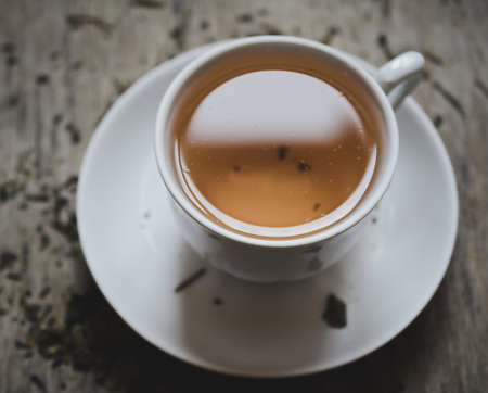 herbal tea cup closeup on the deskの写真素材