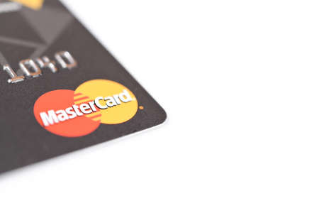 MINSK, BELARUS - February 22, 2017. Credit card with MasterCard logo on white, pay and buy abstractのeditorial素材