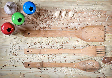 different wooden spoons on the blue tableの写真素材