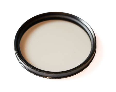 Polarizing and fluorescence lens filter isolated on white background, photo abstractの写真素材
