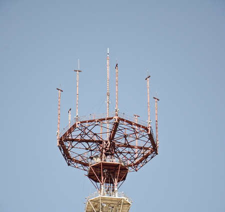 Cell phone tower or Telecommunication tower in blue skyの写真素材