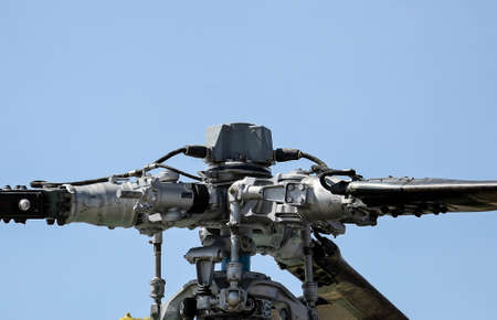 Rotor helicopter clouds close up on a blue sky