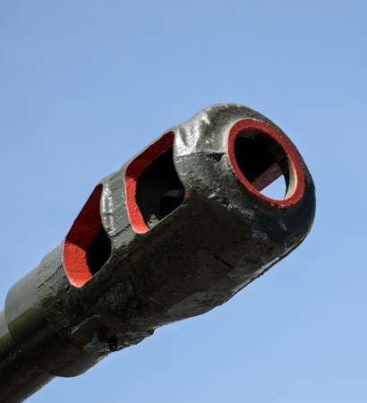 Artillery gun barrel closeup. Second World War on a blue skyの写真素材