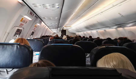 Mosow, Russia - August, 2017 Aircraft passenger cabin with peopleのeditorial素材