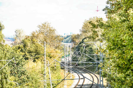 electric railway in a green forest in russia, uralの写真素材