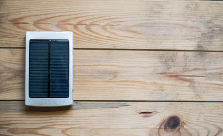 solar panel on the wooden table