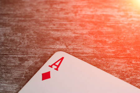 Playing card, game abstract: ace of clubs on the table