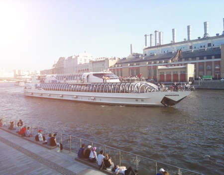 Moscow, Russia - May, 2018: Cruise ship sails on the Moscow river in Moscow city center, popular place for walking.のeditorial素材