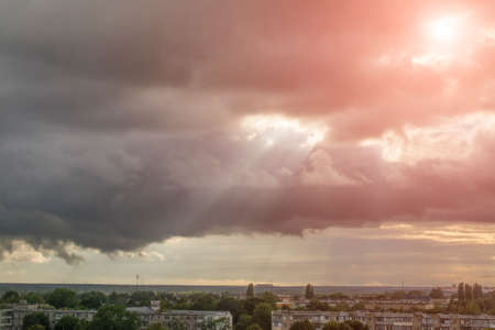 city urban landscape with clouds and sun lightの写真素材