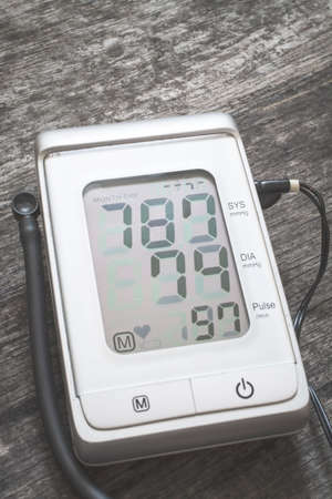 Tonometer. Diagnostic tool close up, 187 and 74 number on screen.
