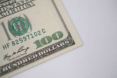 100 dollars bill on white background close up