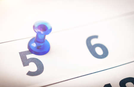 business calendar closeup date point, news abstract