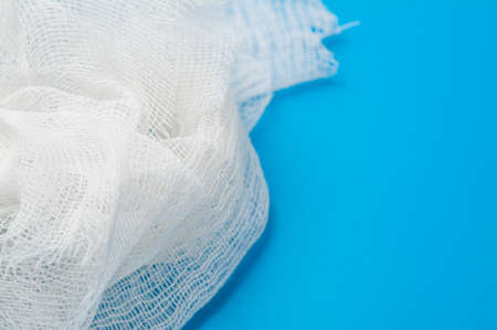 medical bandage over blue background with copyspace