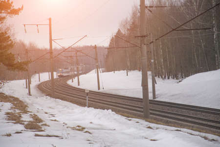 High speed passenger train in motion on the railwayの写真素材