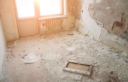 The interior of an abandoned old and dirty room. Old building.の写真素材