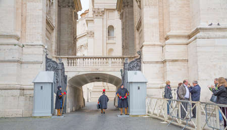 Vatican City, Rome, Italy - February 16, 2015: The gate with swiss guards for entrance to the residence of the Vatican, Romeのeditorial素材