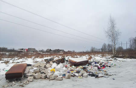 Minsk, Belarus - March 6, 2019: Garbage dump near the forest in Belarus, Minsk Region.