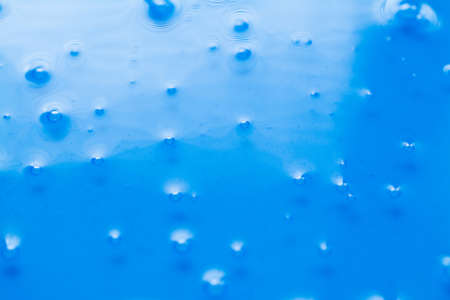 Blue gel liquid background close-up or textureの写真素材