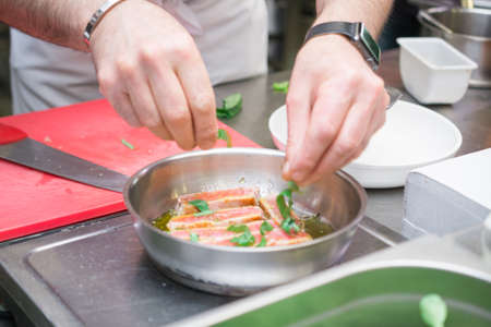 cooking fresh fried fishの写真素材