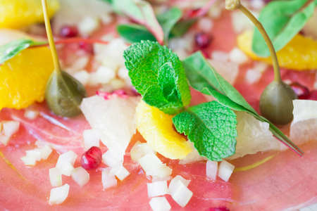 thinly sliced beef dish close-up photo background or textureの写真素材