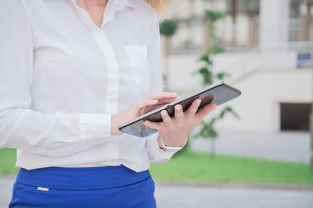 business women holding tablet pc
