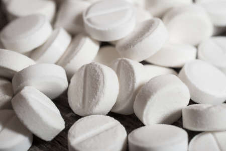 white pills background, Medicine objects, close-up photoの写真素材