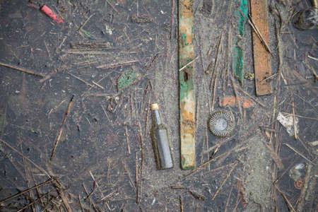 A river full of human pollution trash top view background