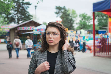 Portrait of a Stylish Pretty Young Woman outdoor urbanの写真素材