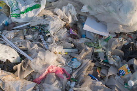 illegal garbage dump in the forest close-upの写真素材
