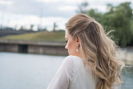 Young beautiful girl fashion shot outdoor a summer day