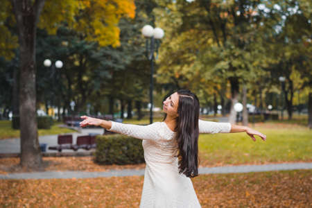 Ballerina dancing for a photographer on a city streetの写真素材