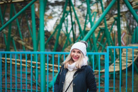 Beautiful portrait woman in the autumn city in cloudy weather