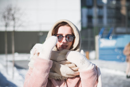 Beautiful and stylish Russian girl model in winter on the street of Moscowの写真素材