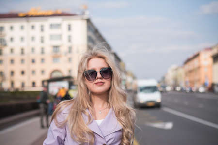 Lifestyle concept, a beautiful girl in the city walksの写真素材