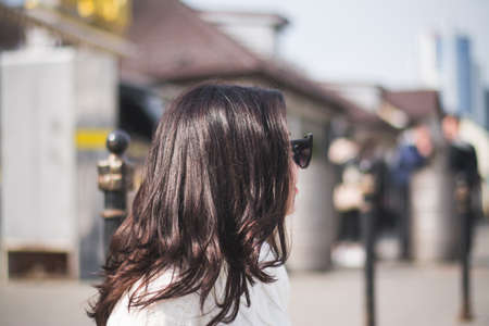 lifestyle fashion portrait of young stylish hipster womanの写真素材