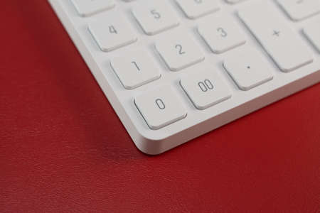 Business concept, white digital calculator close upの写真素材