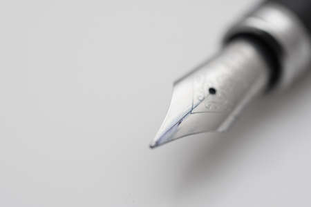 Black ink fountain pen insulated on white backgroundの写真素材