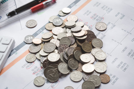 Russian rubles coins pile up on an investor's desk. Translate: Ruble, Russian Federationの写真素材