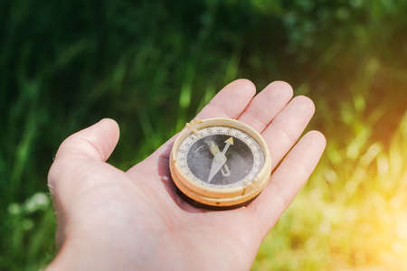 old vintage tourist compass close up nature shot