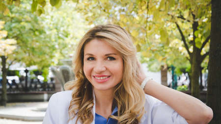 Beautiful white businesswoman portrait in the city