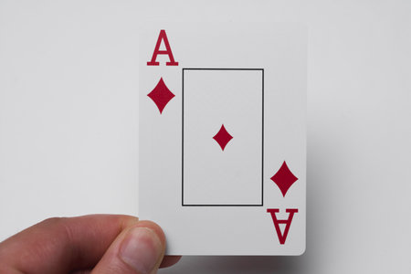 Playing cards, Ace of Diamonds in handの写真素材