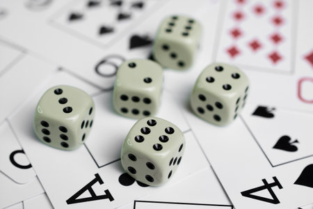 Four tens playing cards in close-up