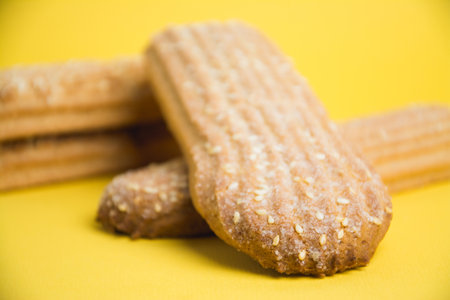 Delicious sugar cookies on a yellow backgroundの写真素材