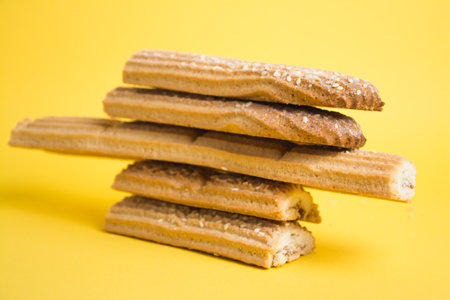 Delicious sugar cookies on a yellow background