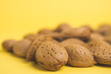 almonds on a yellow background