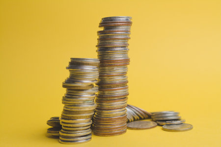a stack of old vintage coins close upの写真素材