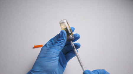 addicts table pills and injection on the black tableの写真素材