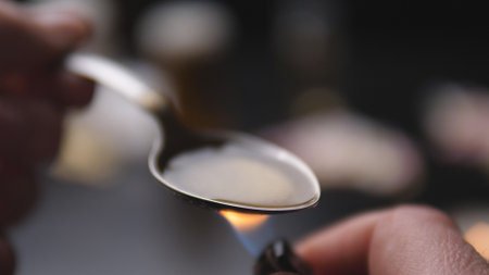 addict preparing dose of crack close upの写真素材